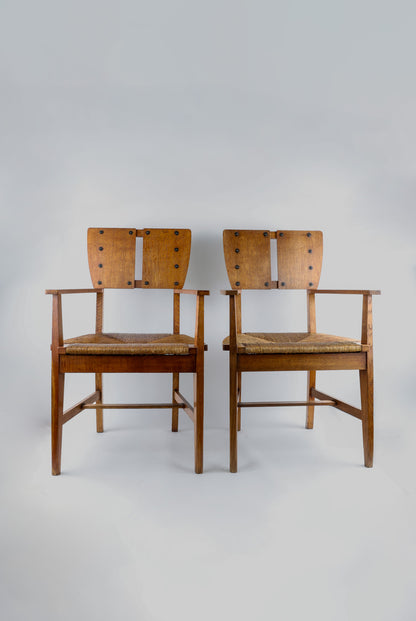 Paar eiken armstoelen van Gustave Serrurier-Bovy, ca. 1904